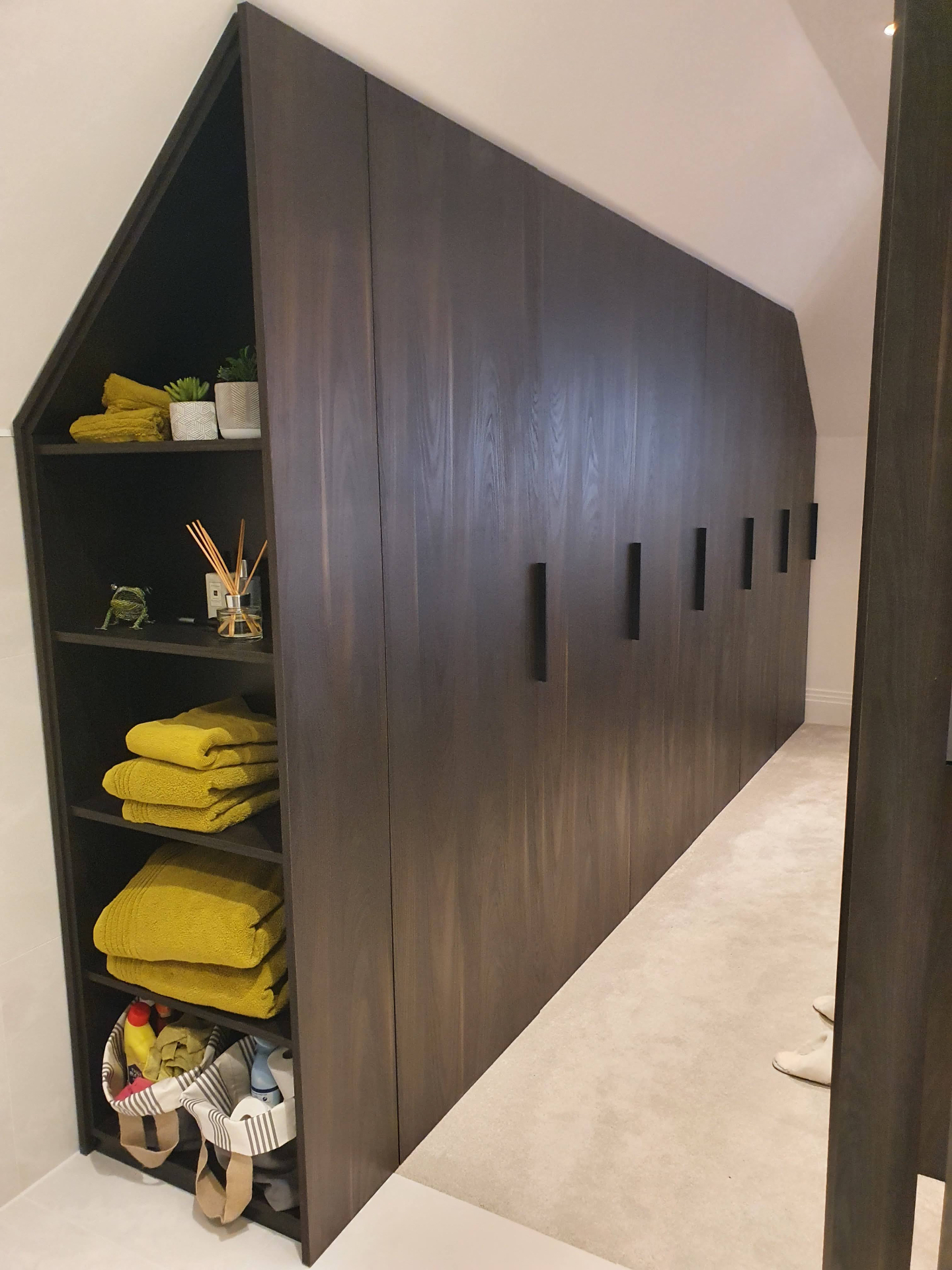 Custom-made fitted wardrobes and alcove units in a Winchmore Hill North London home by Make Space Bespoke