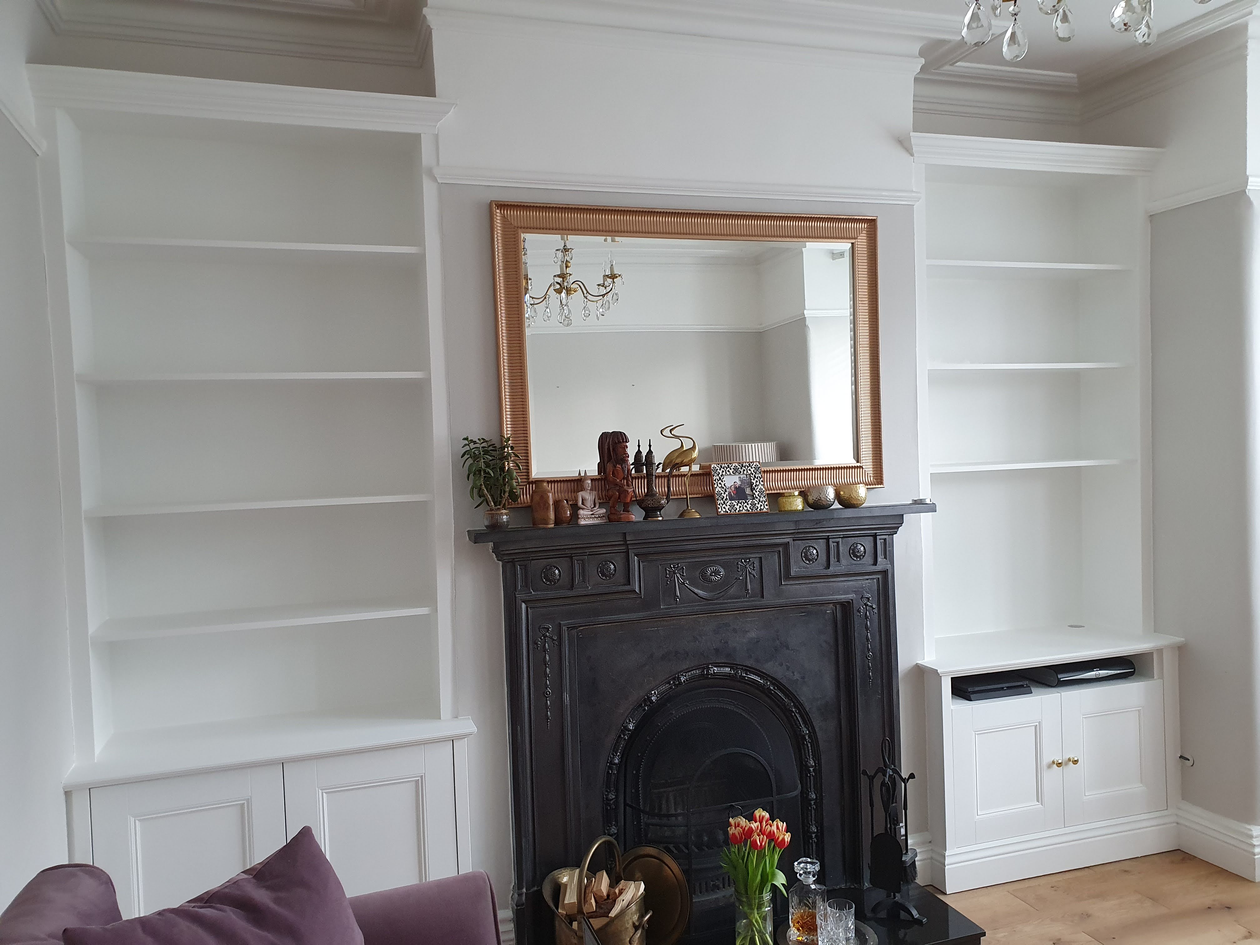 Traditional Hague Blue alcove unit with shaker doors and open shelving in a living room