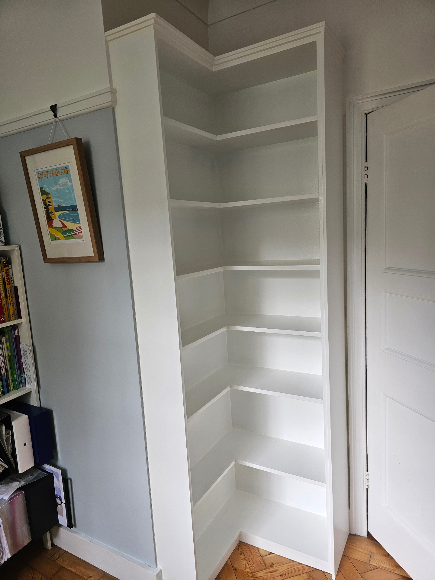 White corner bookcase fitted to measure