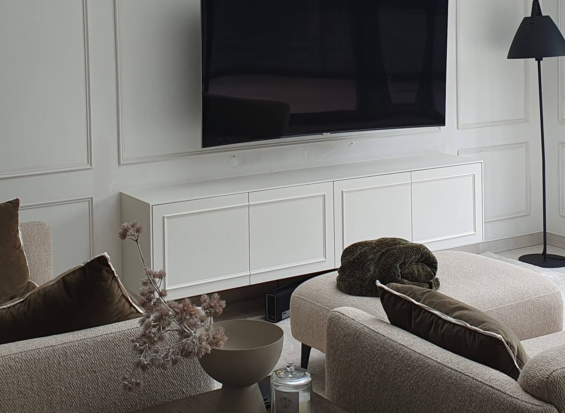Bespoke fitted wardrobe and alcove units in Winchmore Hill home showing custom craftsmanship and minimalist design